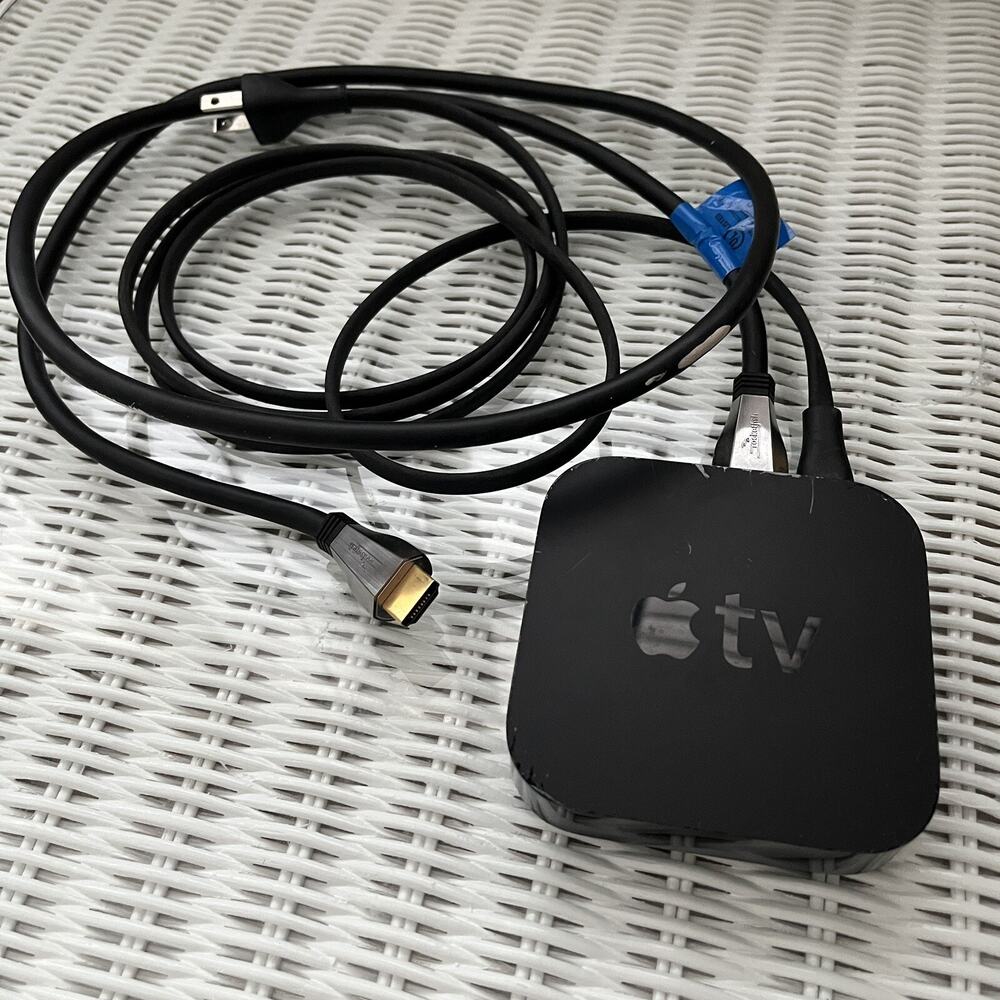 Apple TV 3rd generation HD media, model A1469, with power cable and HDMI cable